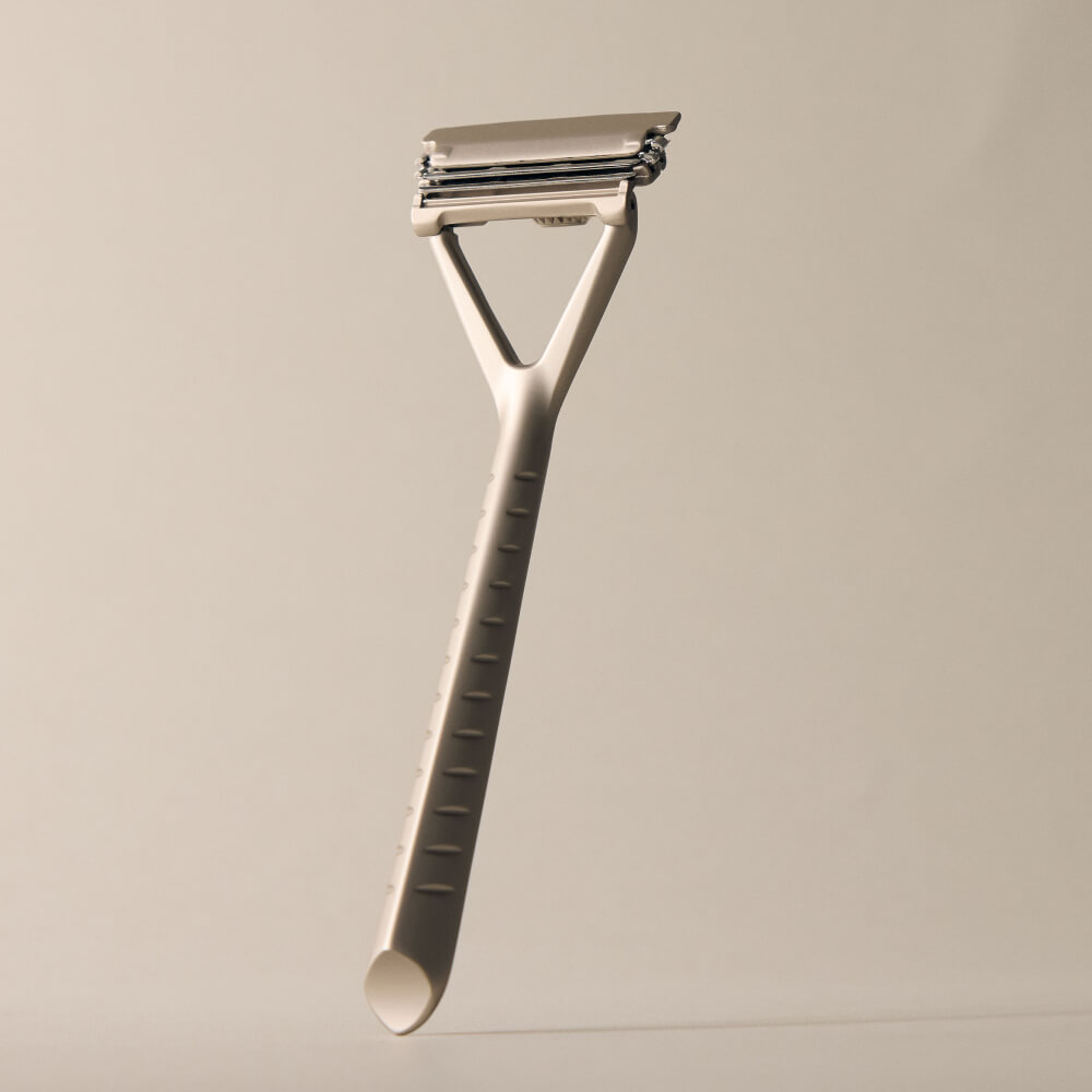 Leaf razor displayed upright in silver