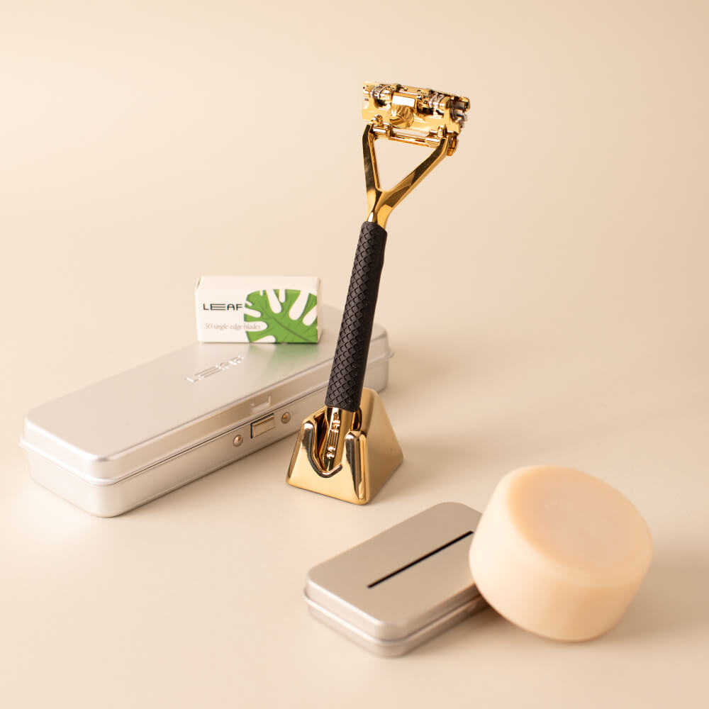 The gold leaf super bundle with a Leaf razor, blades, case, recycling tin, and shave soap bar