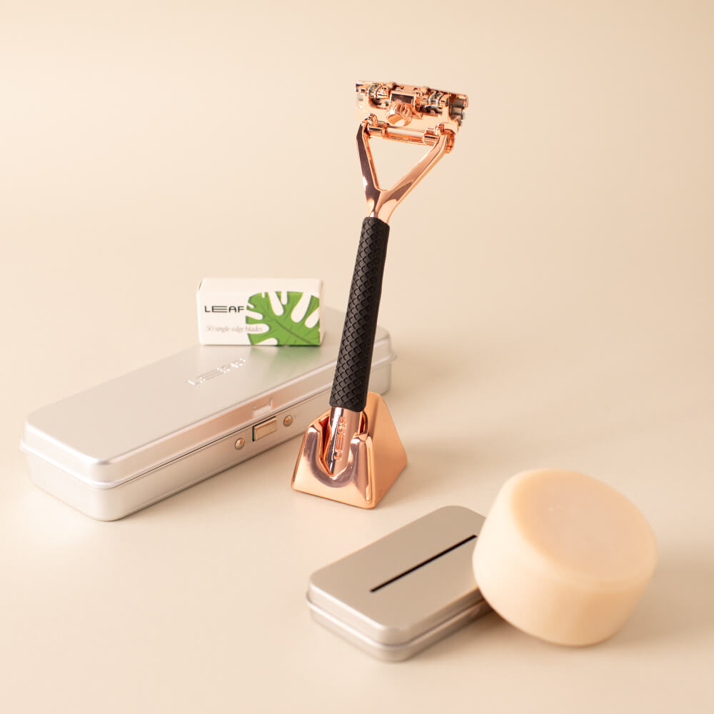 The rose gold leaf super bundle with a Leaf razor, blades, case, recycling tin, and shave soap bar