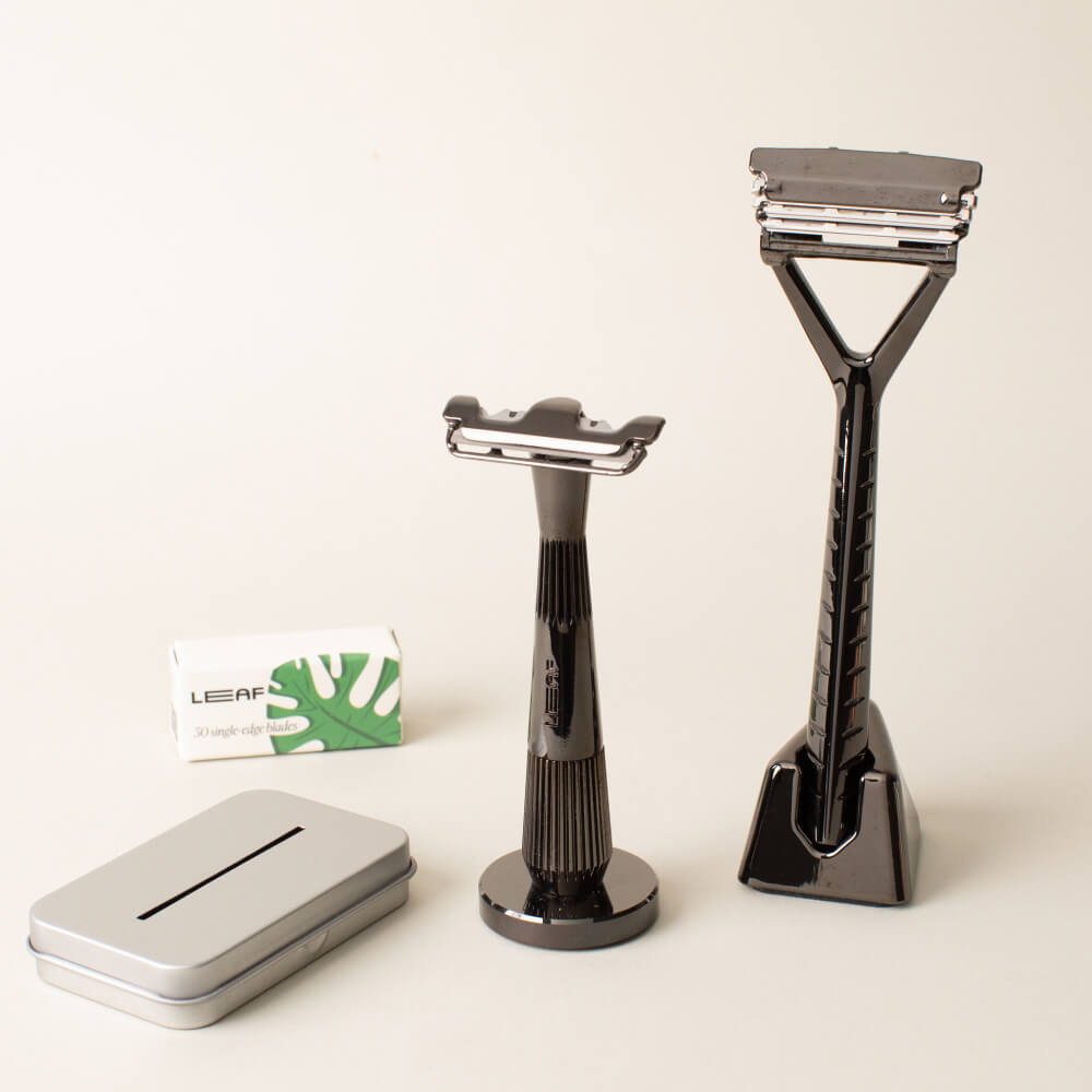 A mercury razor set kit with a leaf and single edge razors, blades, and recycling tin