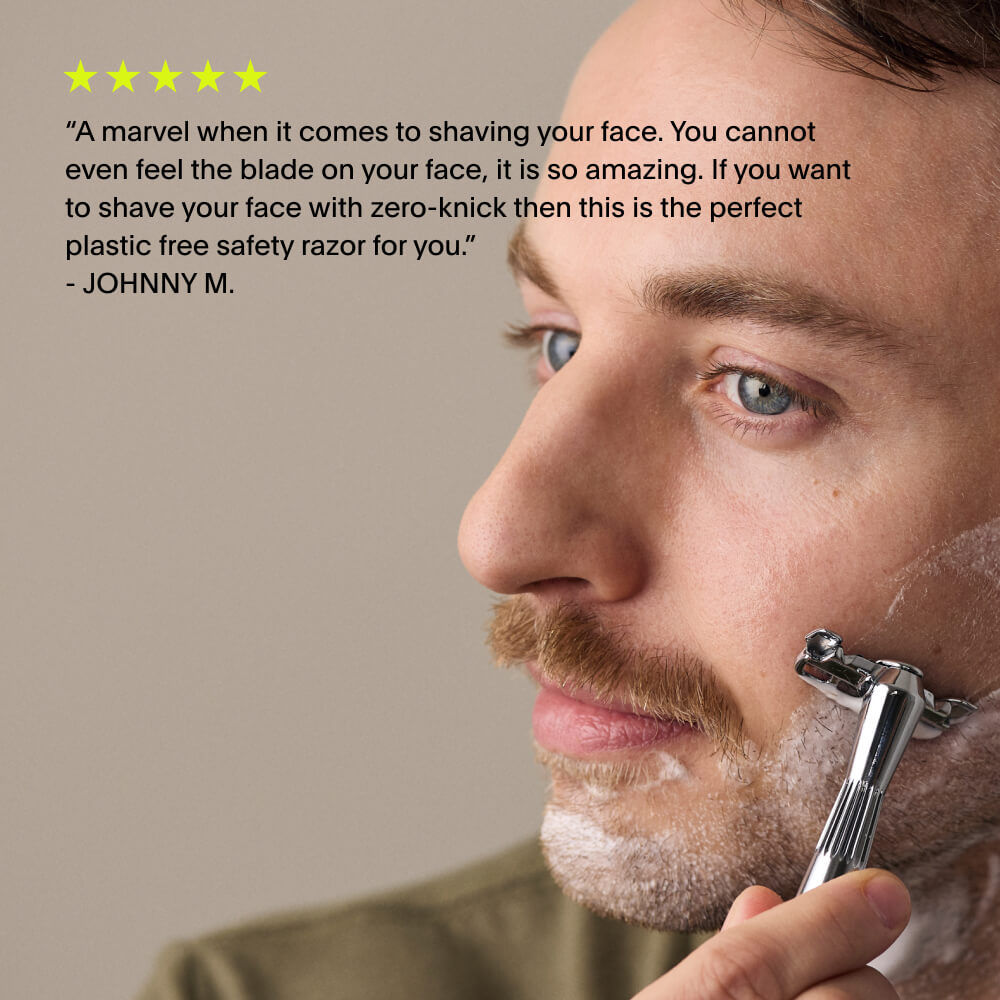 A 5 star customer review of the single edge razor over a man shaving his beard