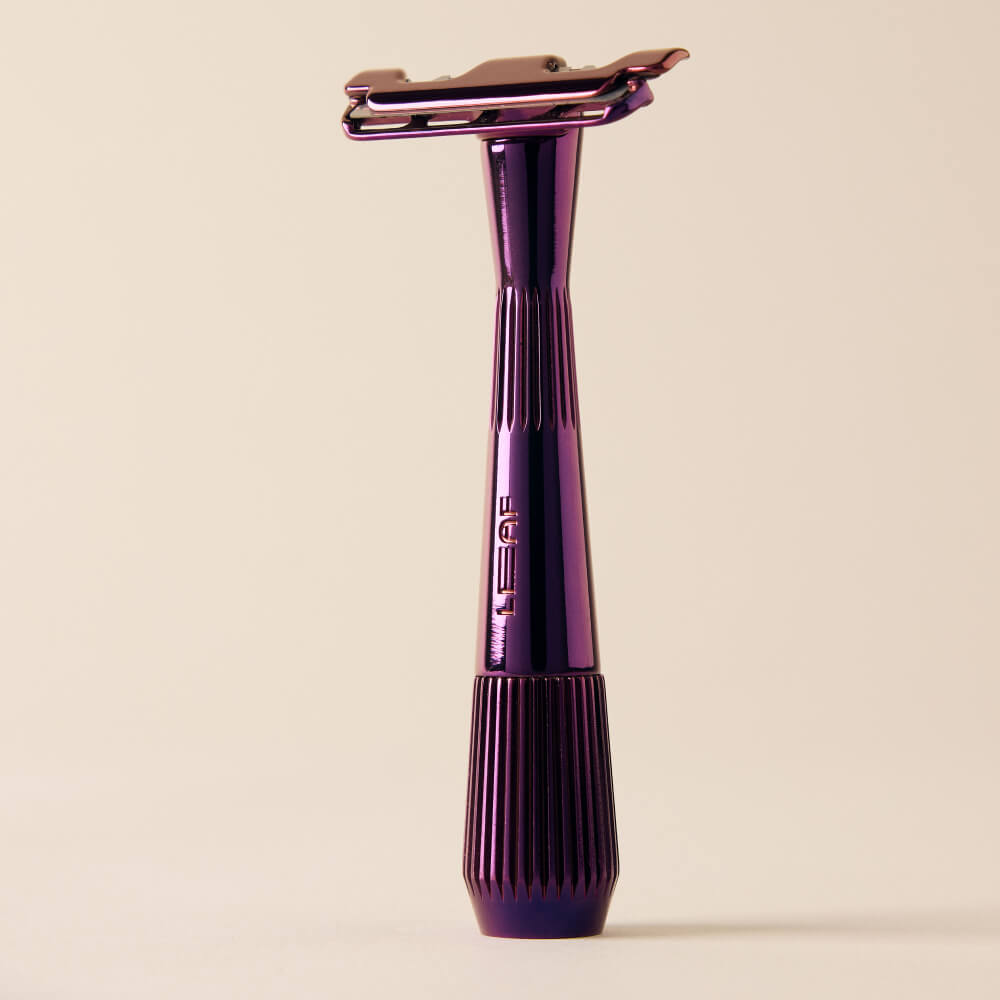 Fig single edge razor standing by itself