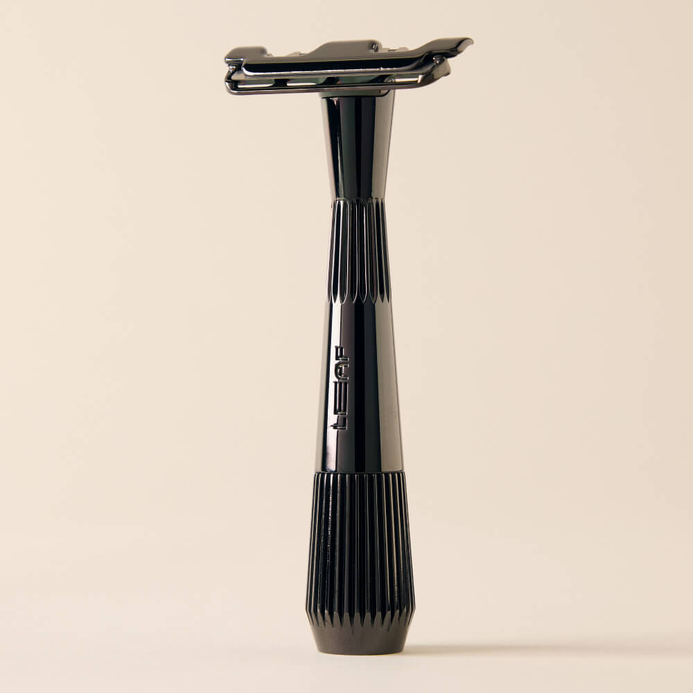 Mercury single edge razor standing by itself