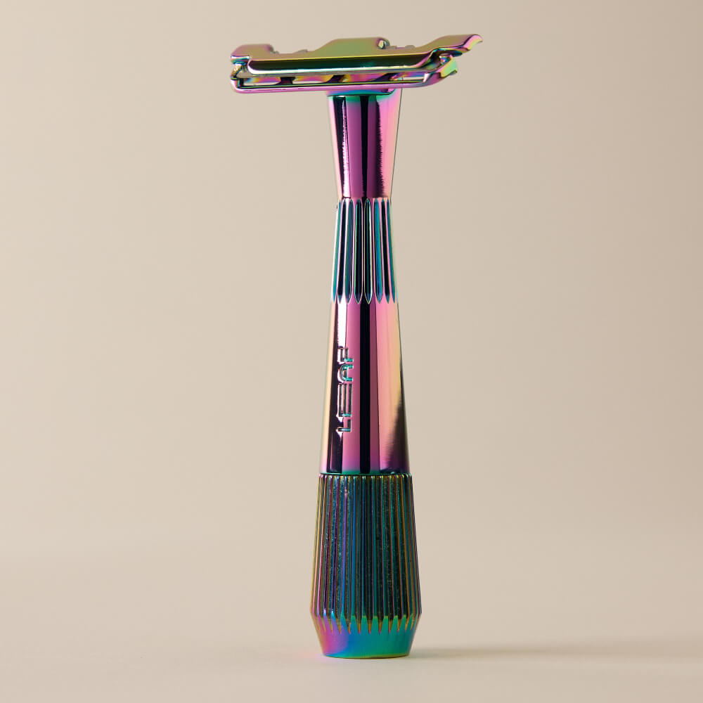 Prism single edge razor standing by itself