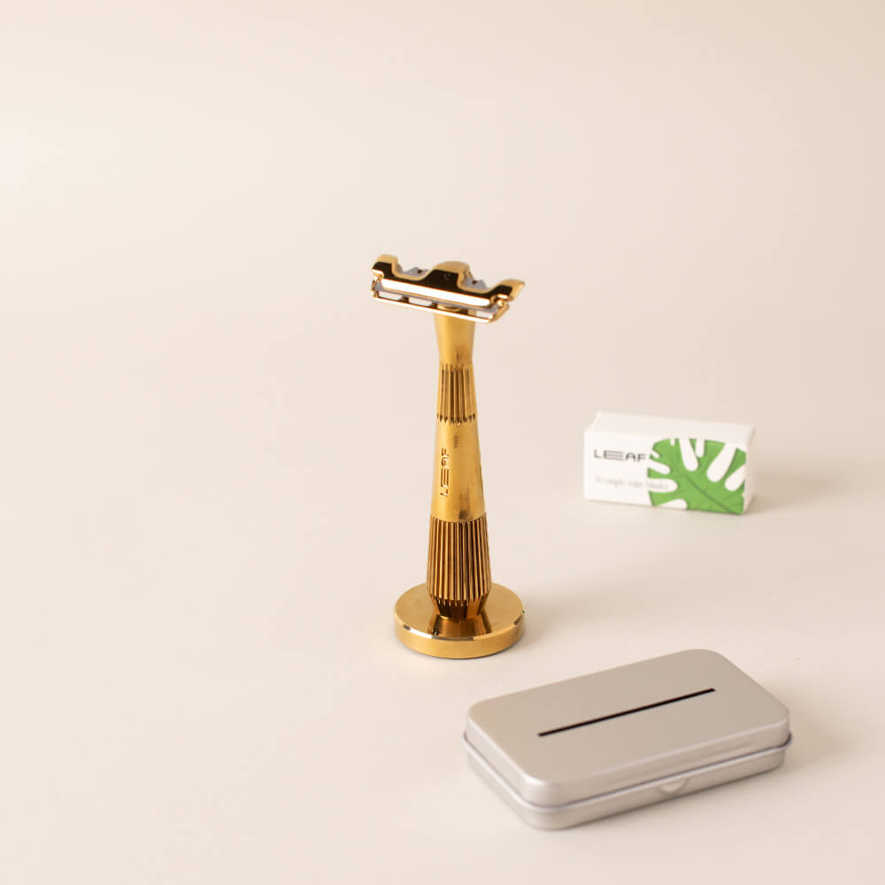 Gold single edge kit with single edge razor, blades, and recycling tin