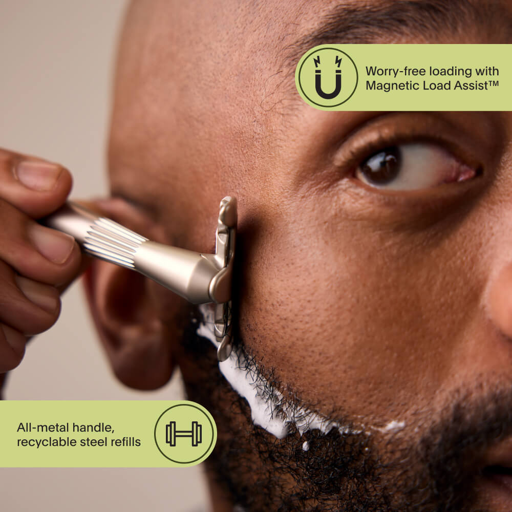 A man shaves his facial area with the single edge razor and its usability callouts